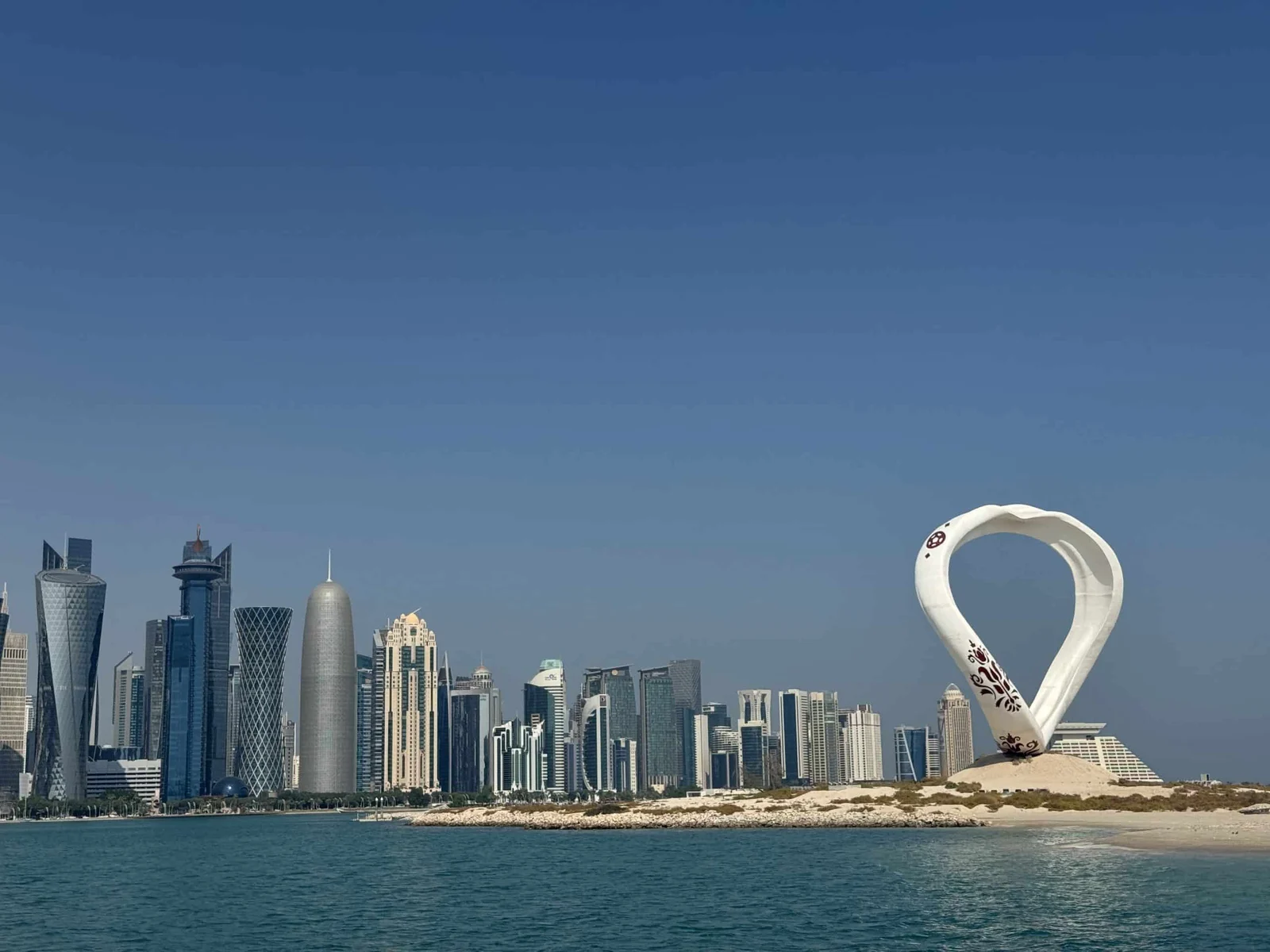 Modern skyline with distinctive sculpture