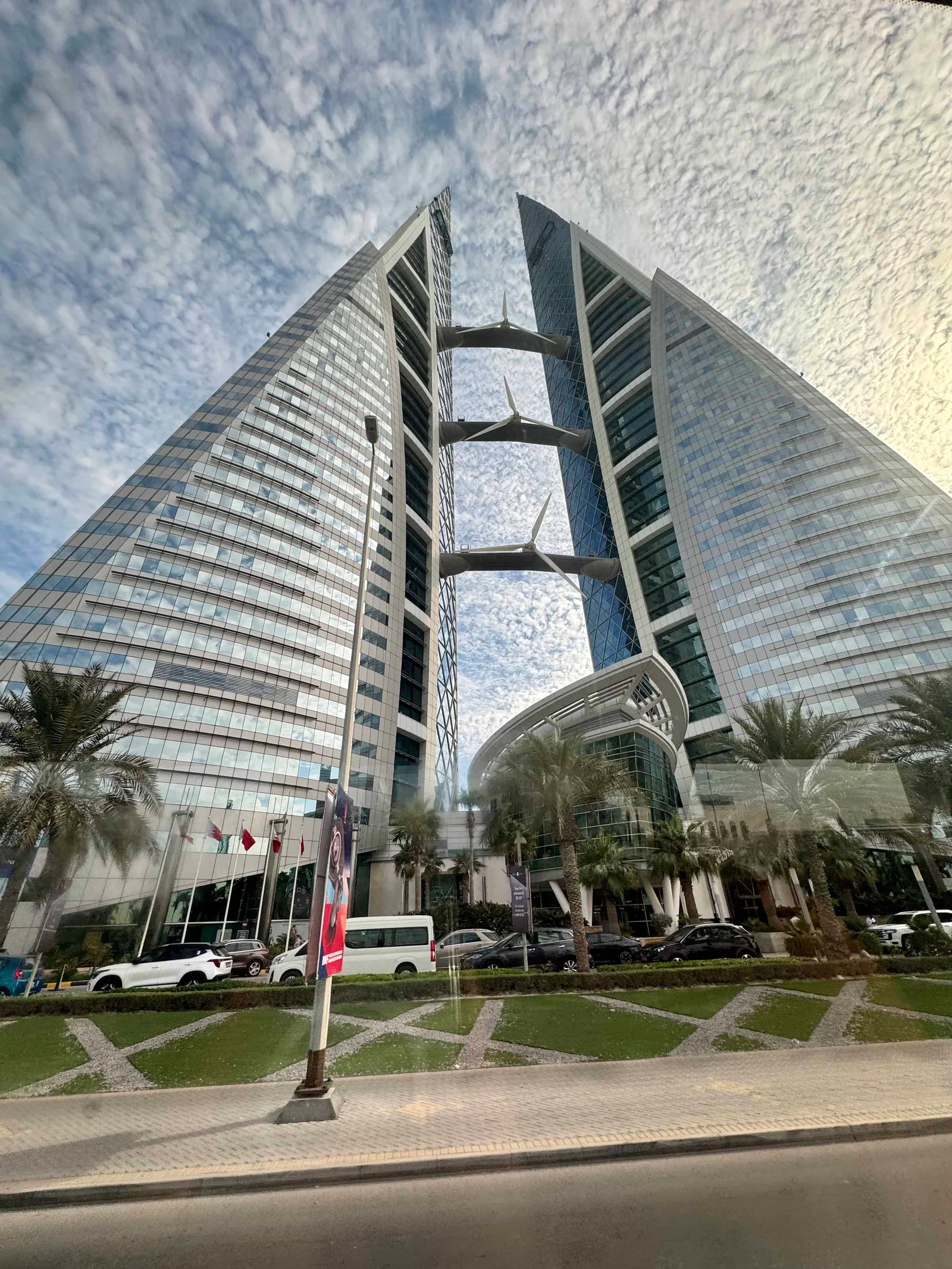 Modern glass skyscraper with arch