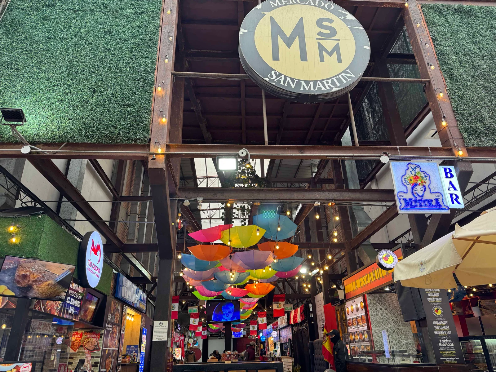 Colourful umbrellas hanging in market