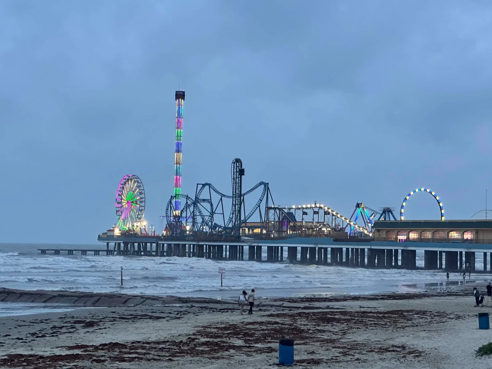 Amusement park on pier over ocean