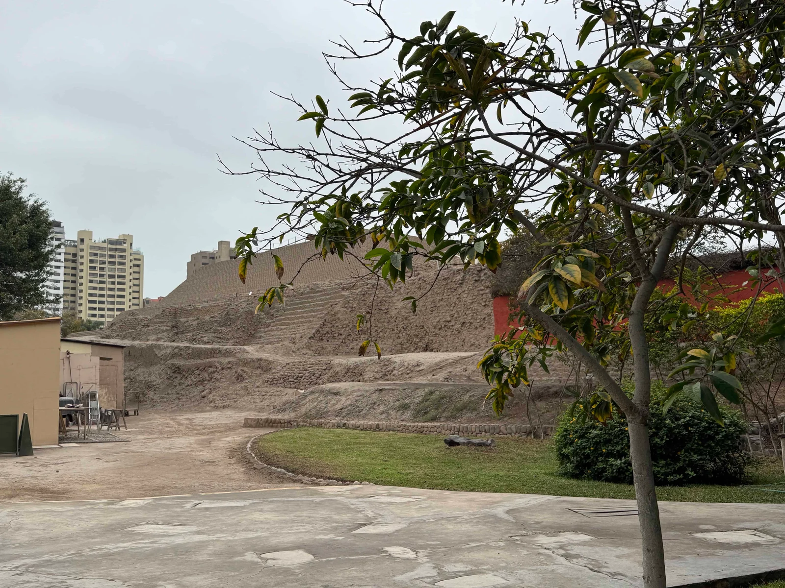 Ancient adobe pyramid in city