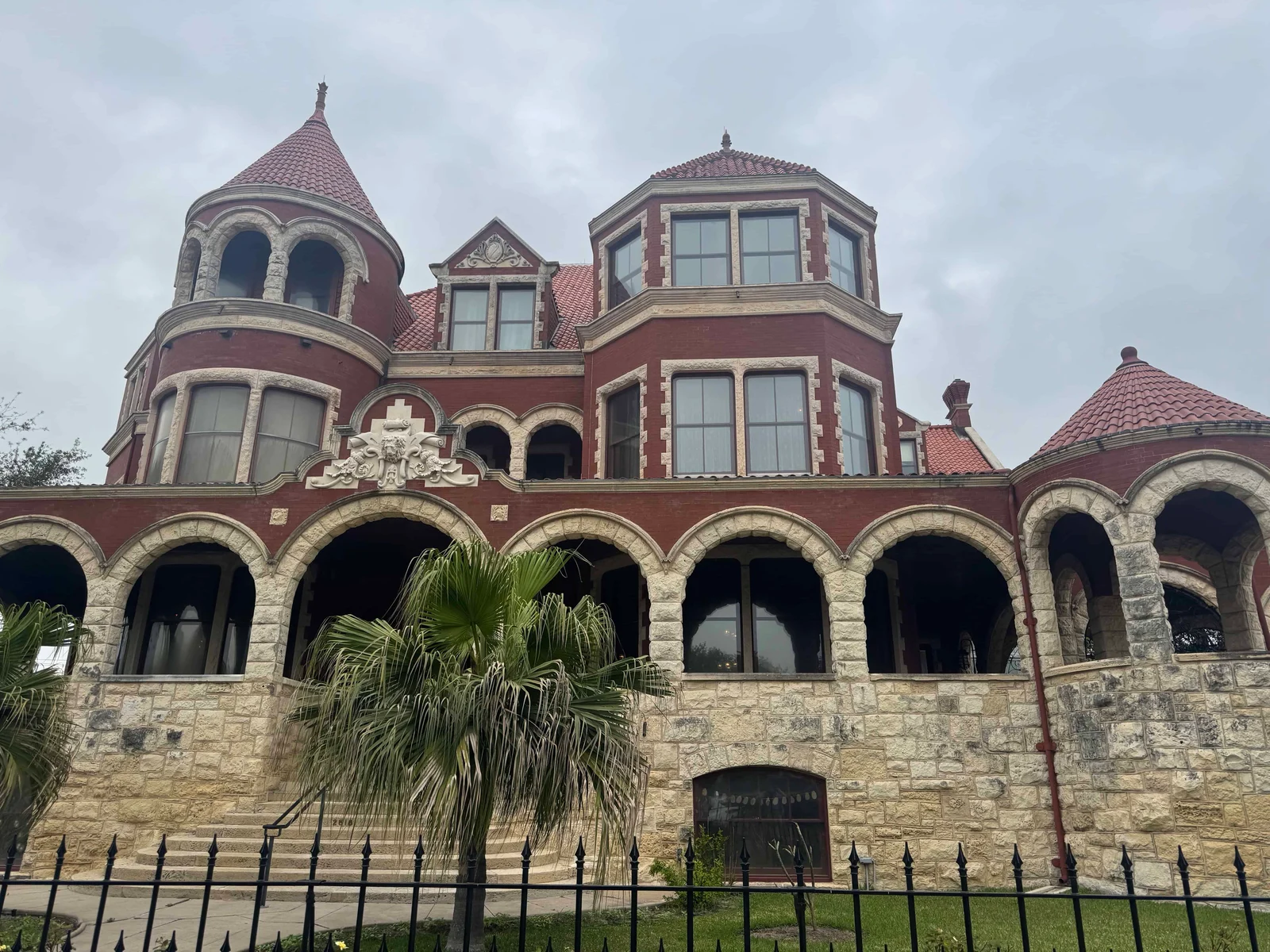 Red brick mansion with turrets