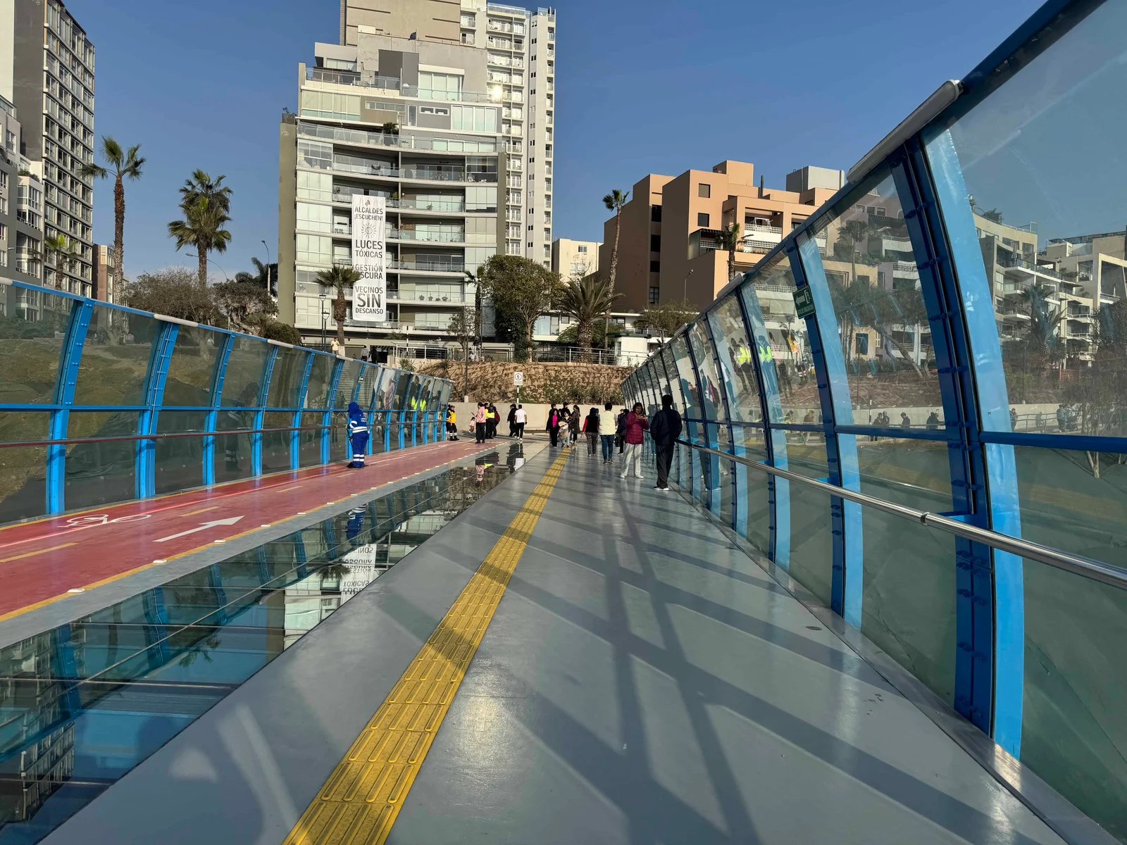 Pedestrian bridge with blue railings