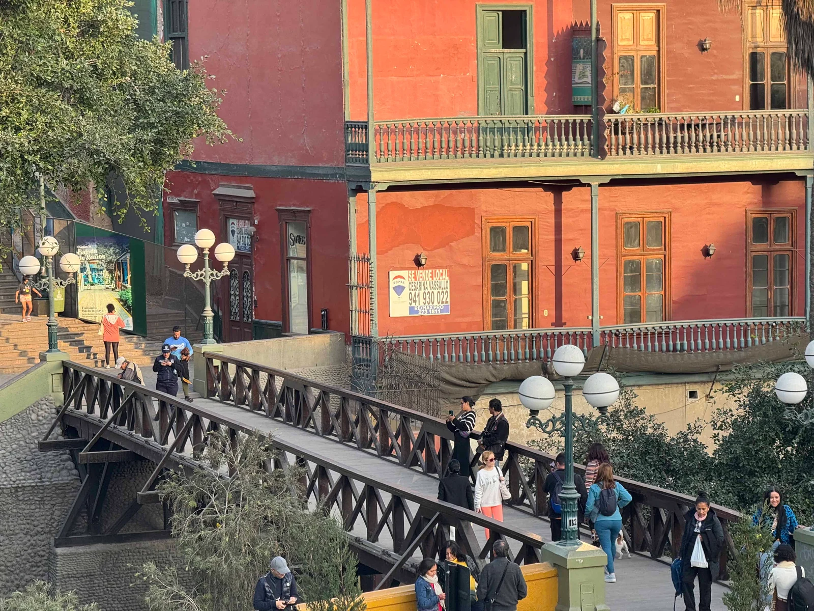 Wooden bridge over cobblestone street