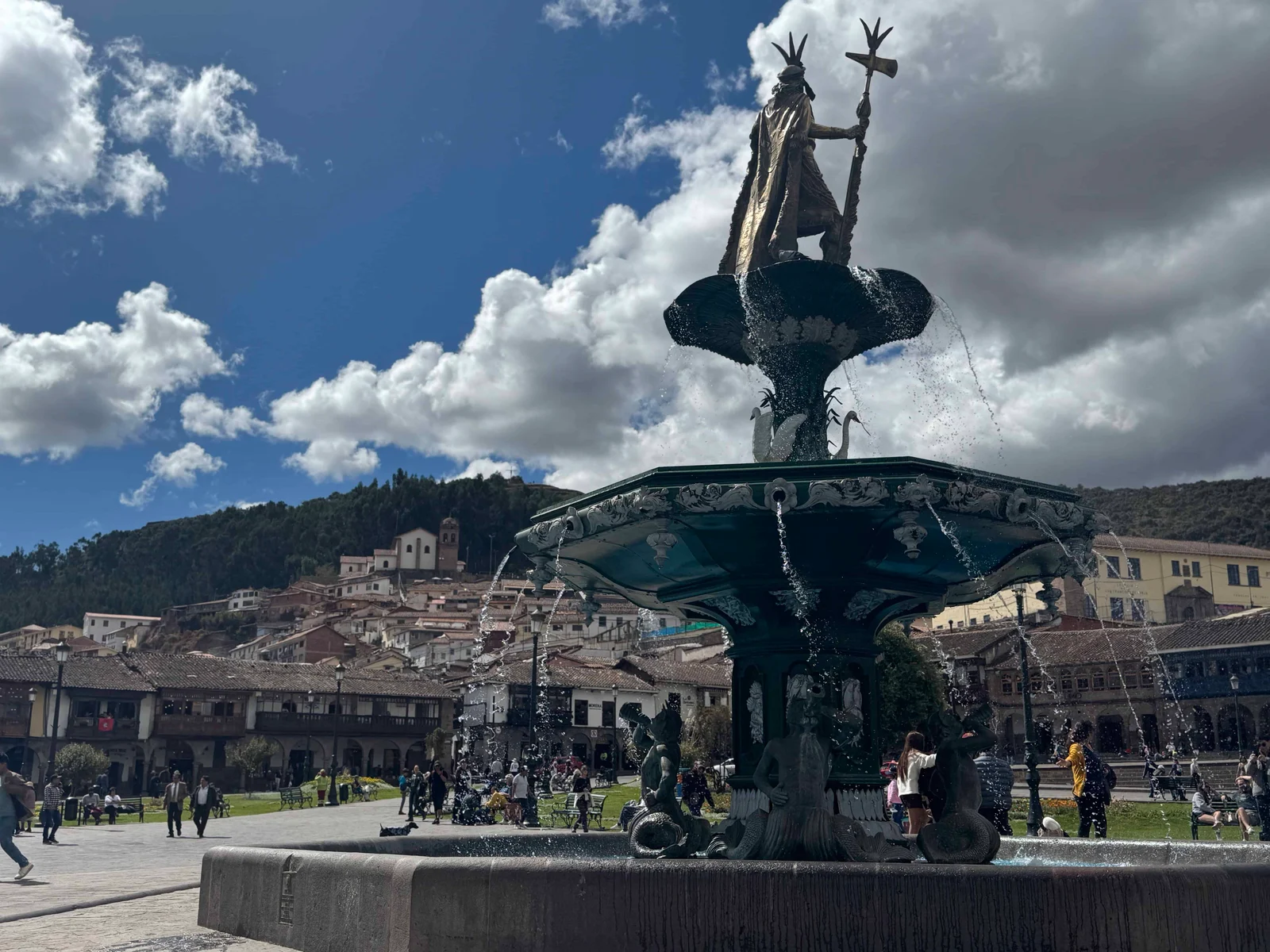 Ornate fountain with statue top