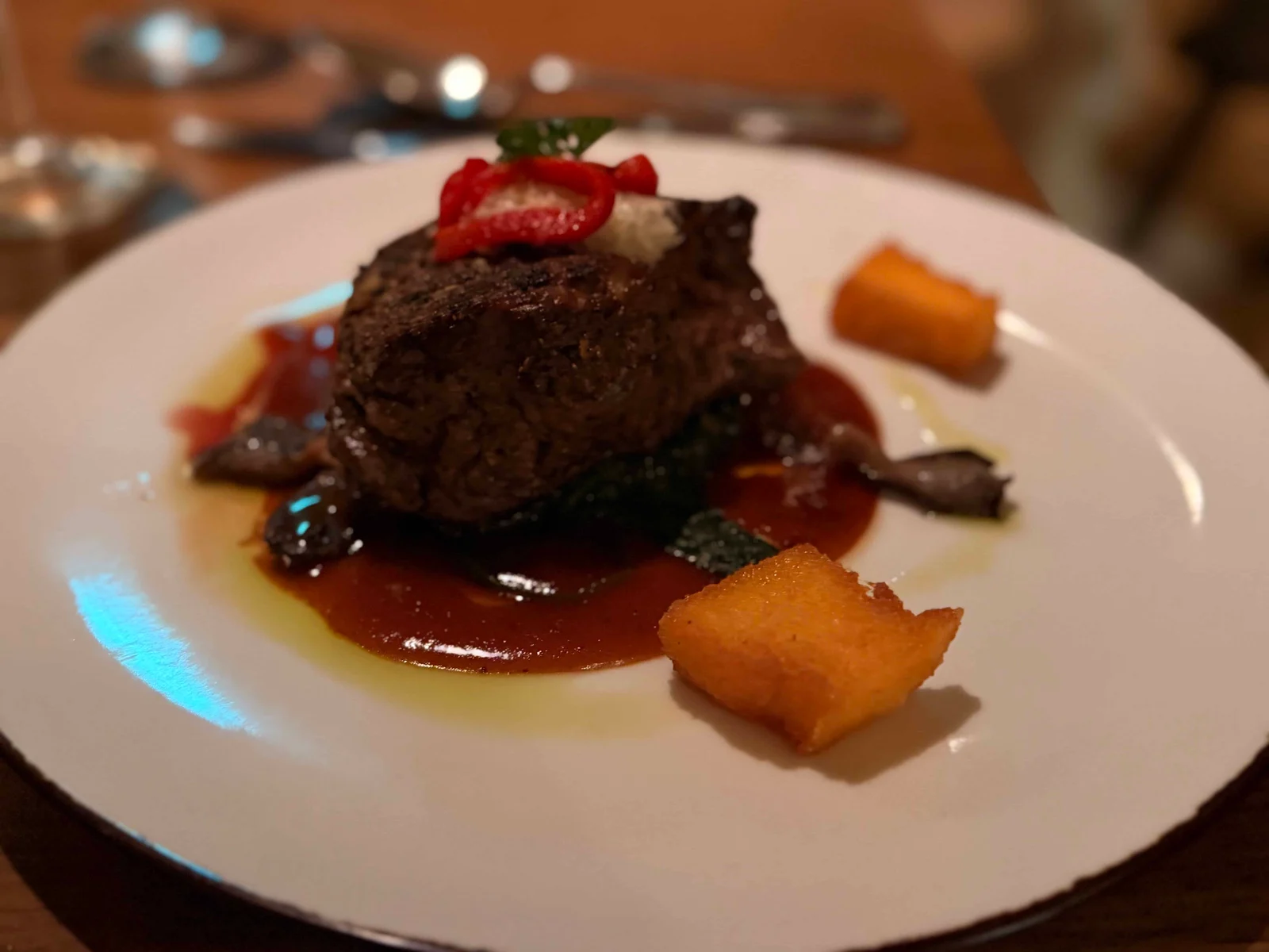 Steak with sauce and garnish