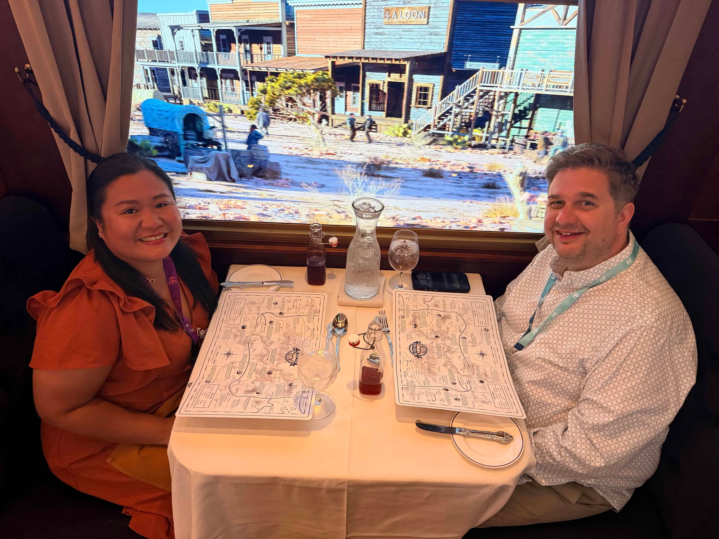 Couple dining with maps onboard