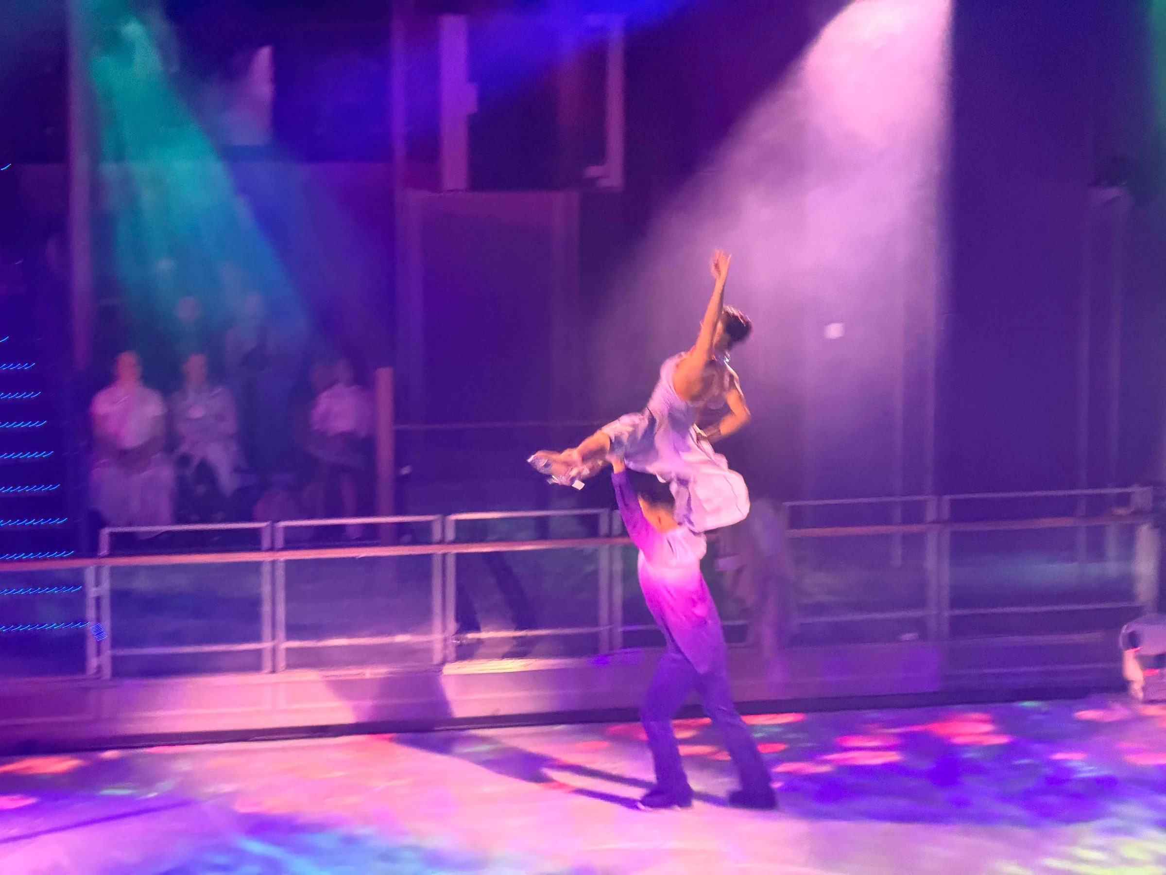 Acrobats performing aerial dance routine