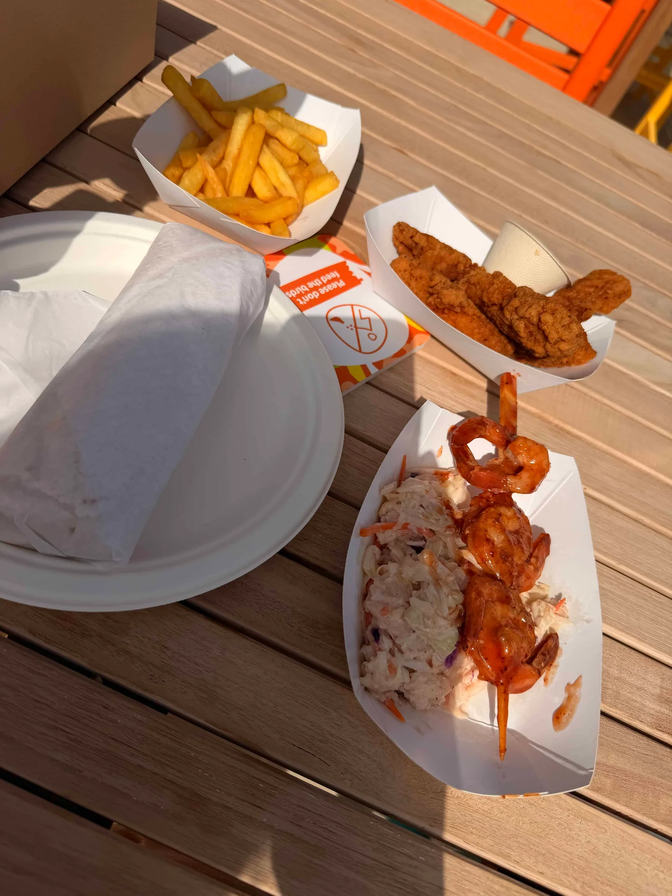 Fast food meal on wooden table