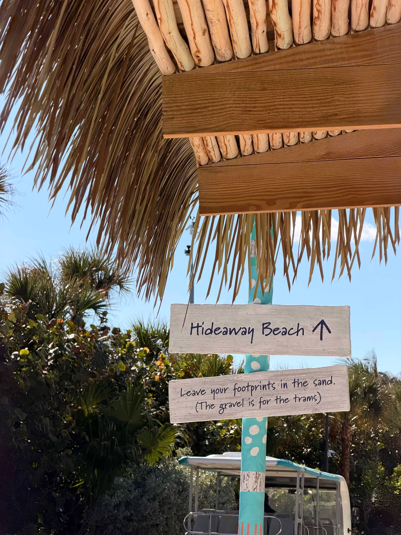 Wooden sign for Hideaway Beach