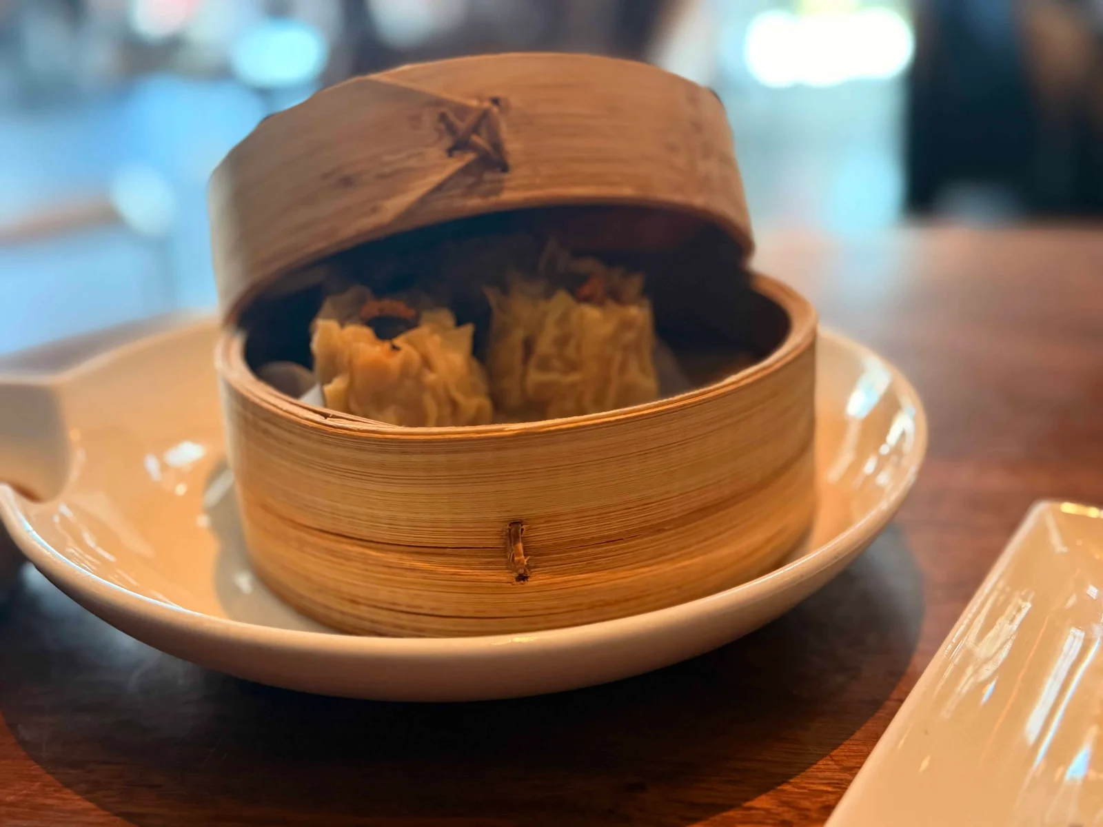 Steamed dumplings in bamboo steamer