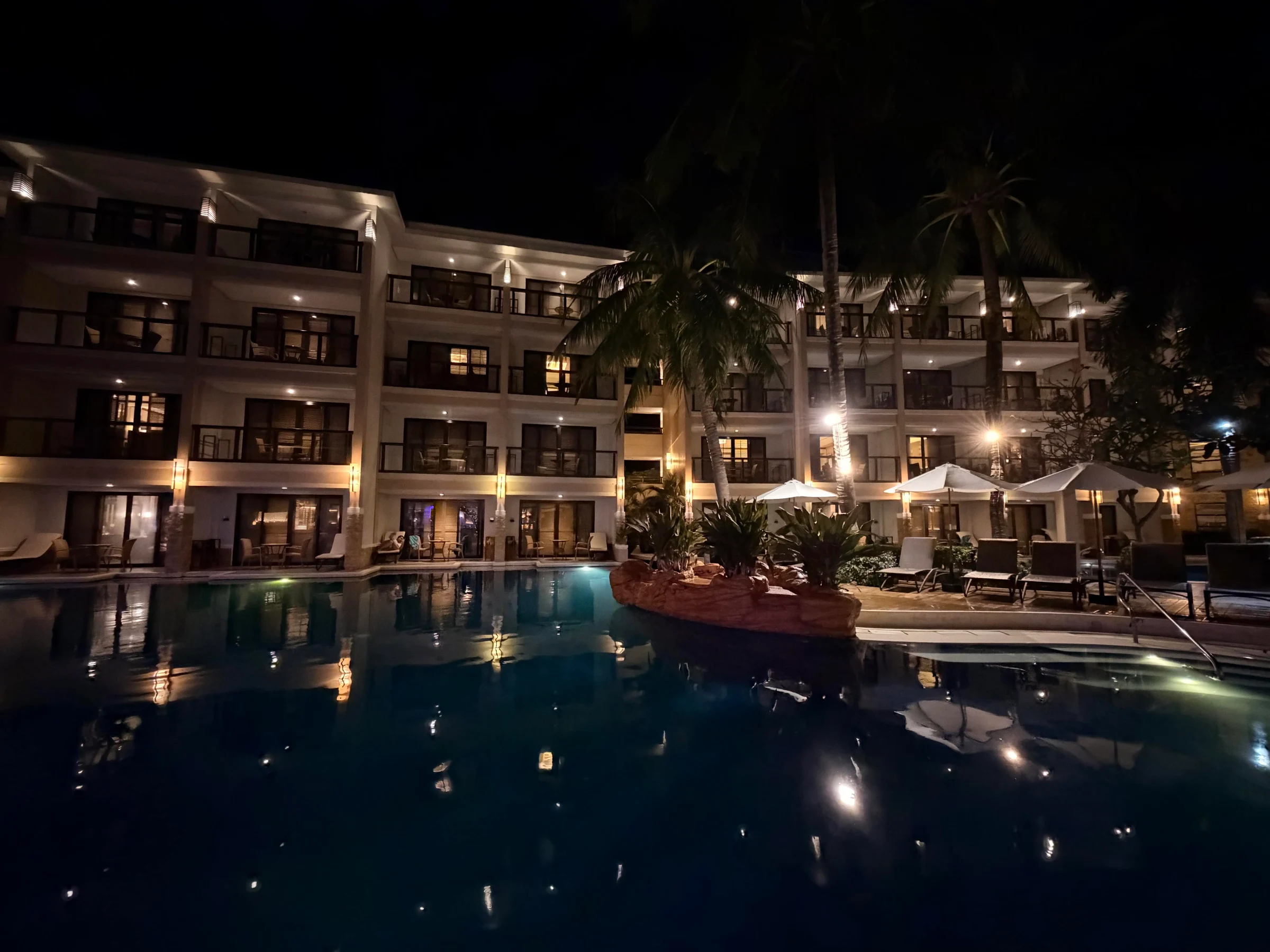 Hotel pool with lounge chairs