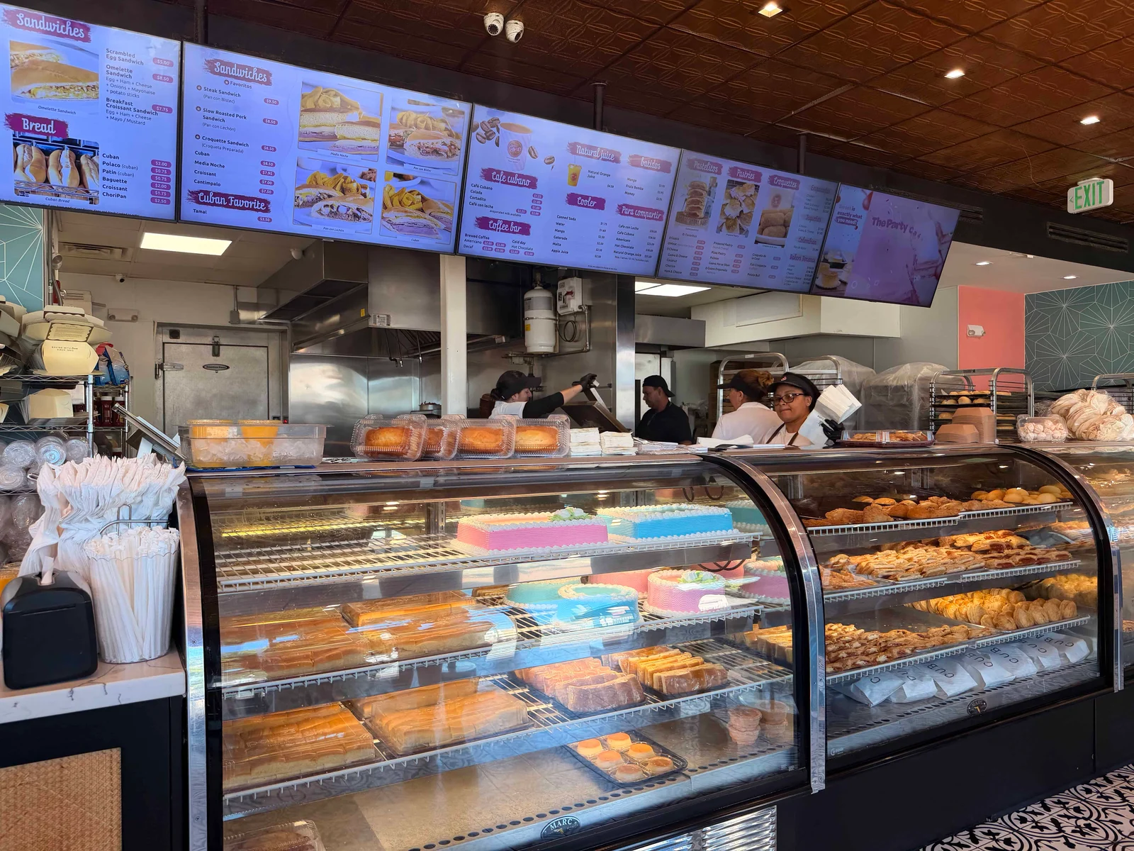 Bakery counter with pastries and sandwiches