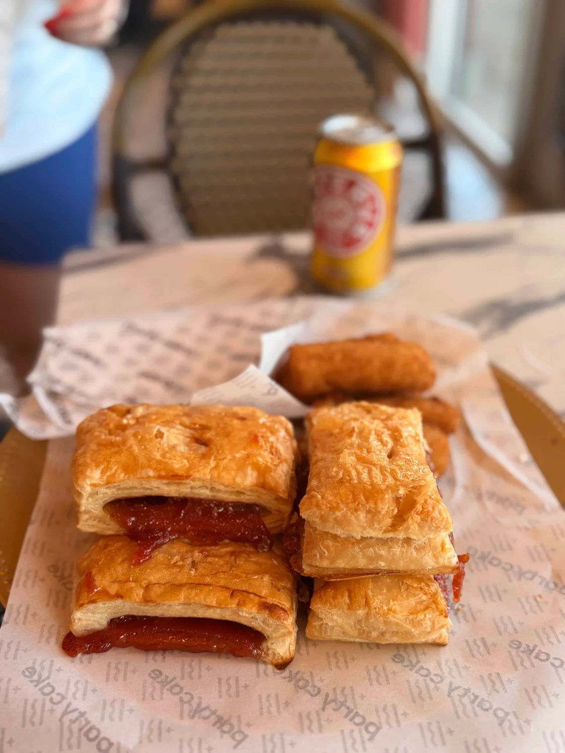 Pastries and soda on table