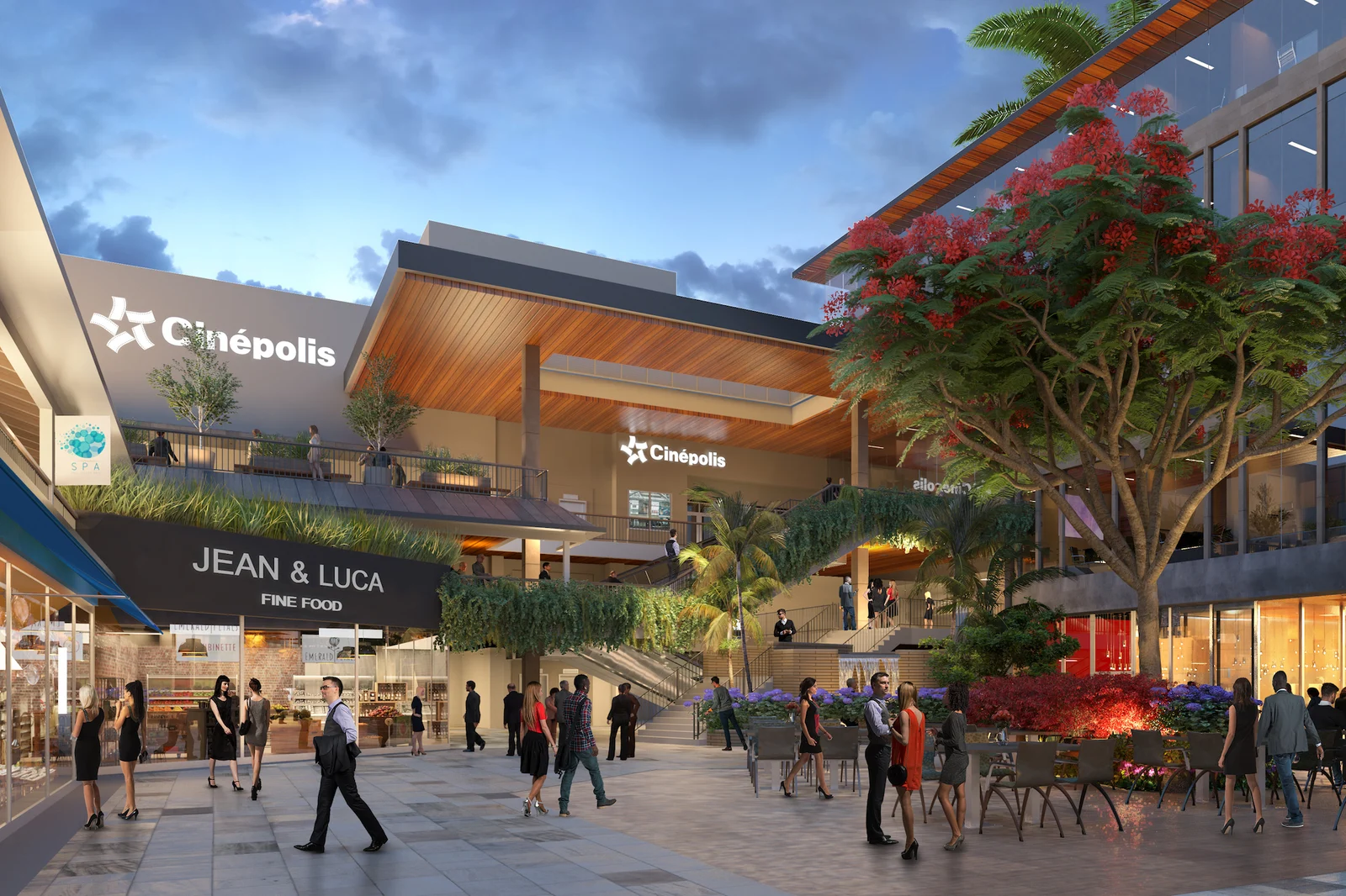 A busy open-air shopping centre at dusk with a Cinepolis cinema, a fine food restaurant and people walking among trees.
