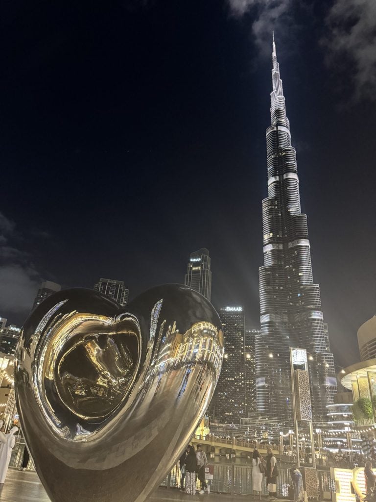 Burj Khalifa at night with sculpture