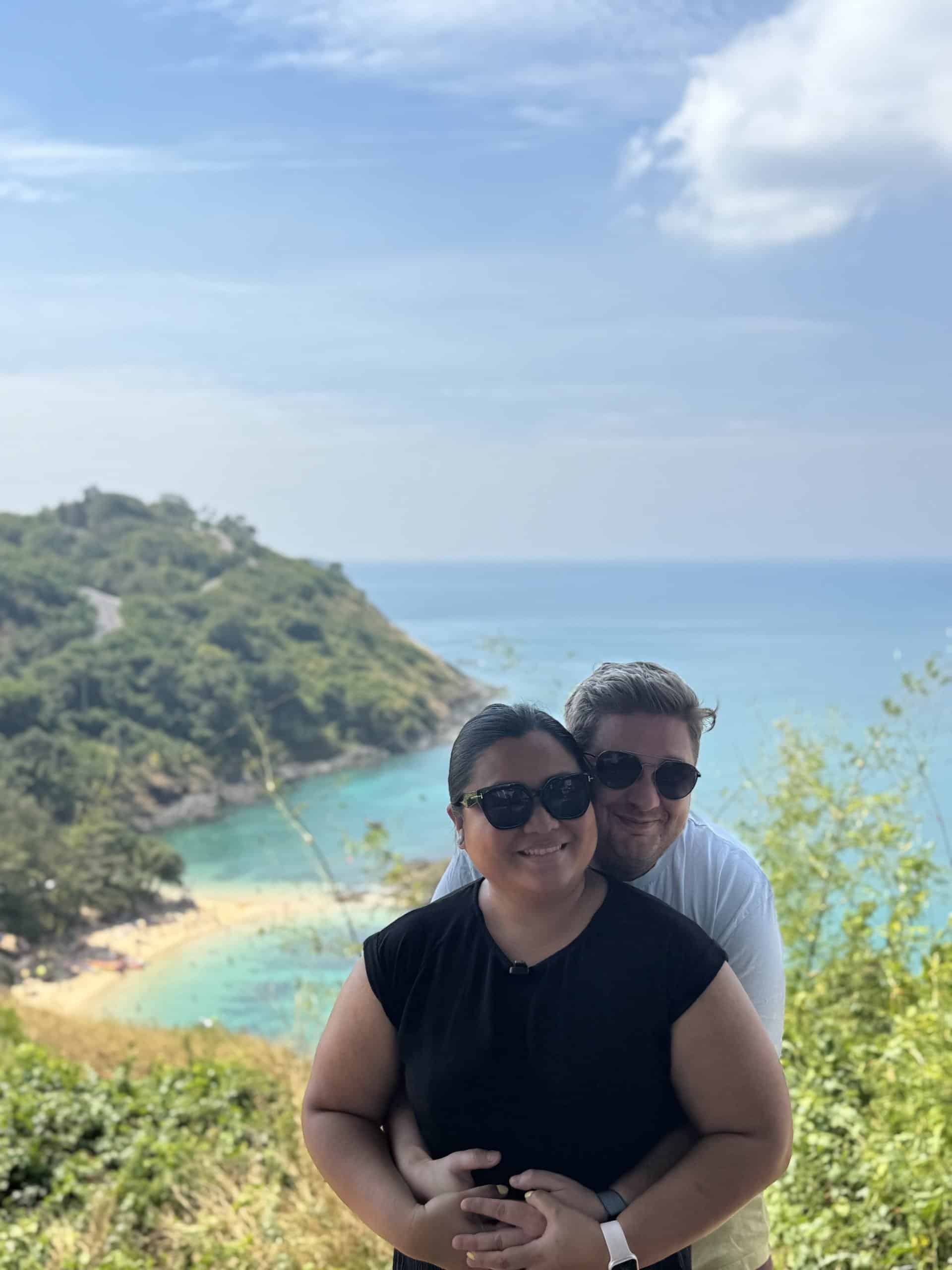 Couple posing with ocean view