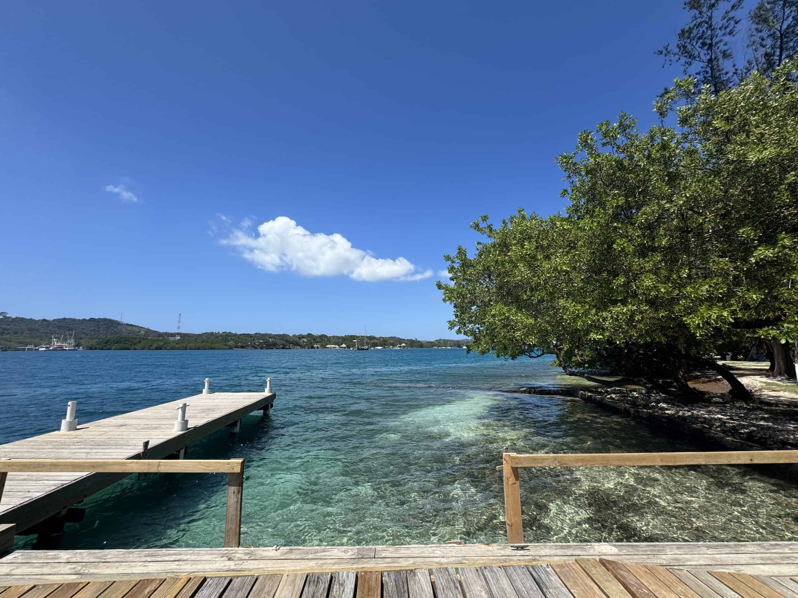 Wooden dock over clear water