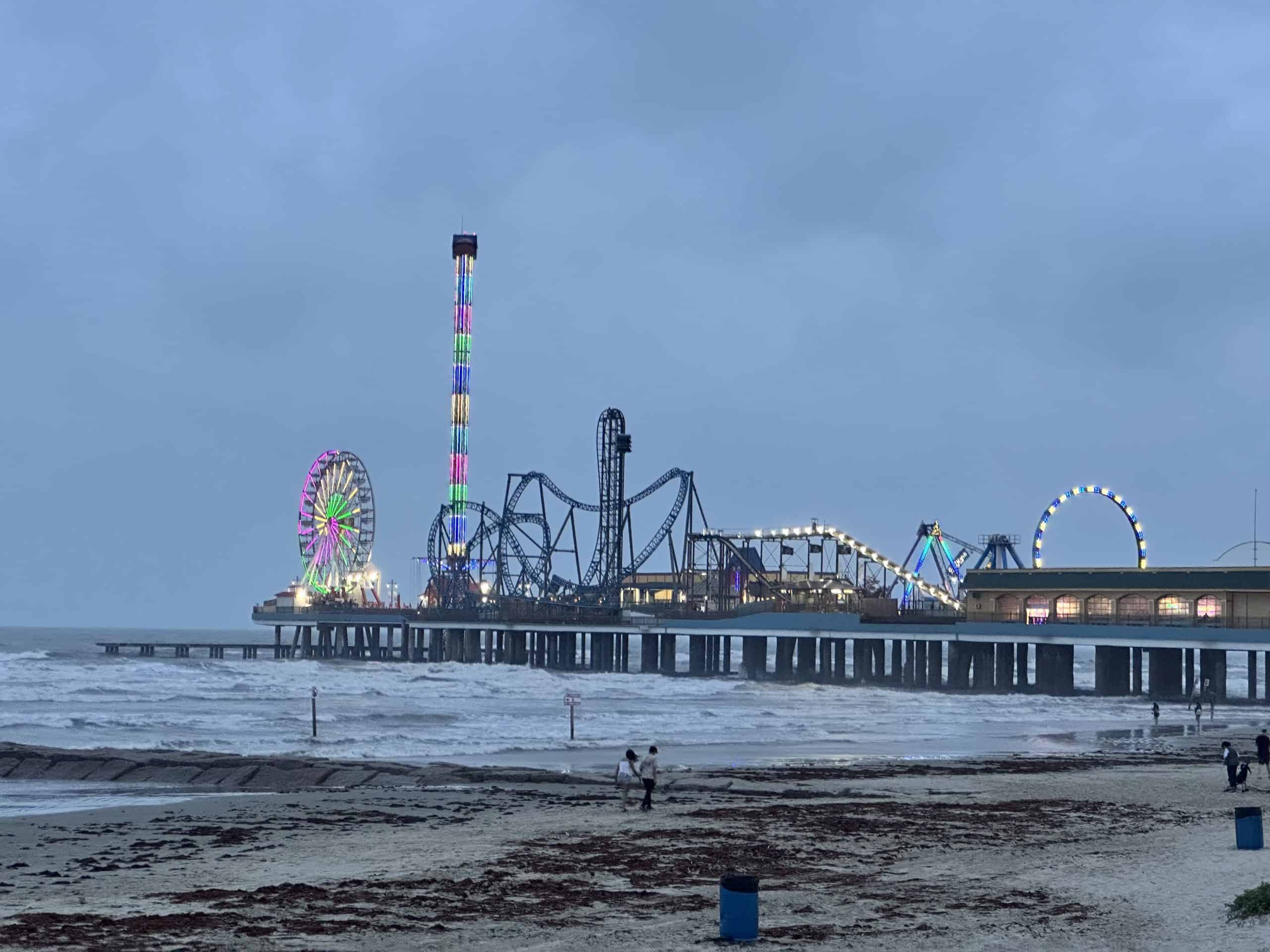 Amusement park on pier over ocean