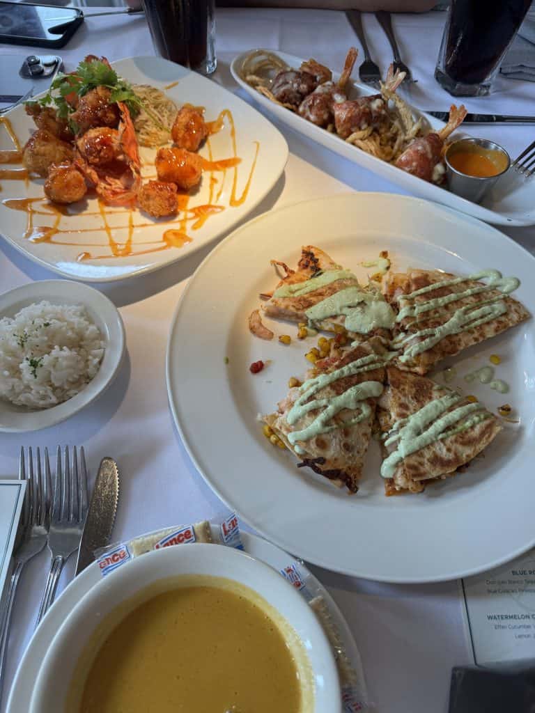 Three plates of different foods