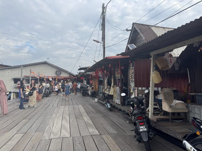 Wooden boardwalk with people and scooters