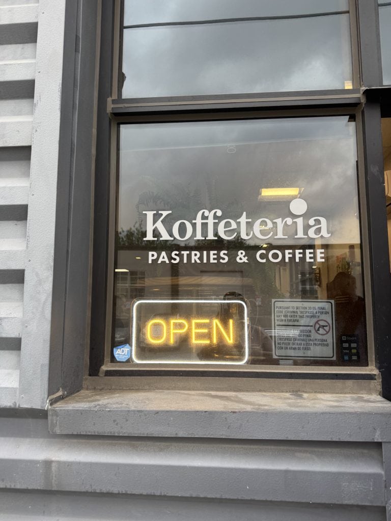 Coffee shop window with neon sign