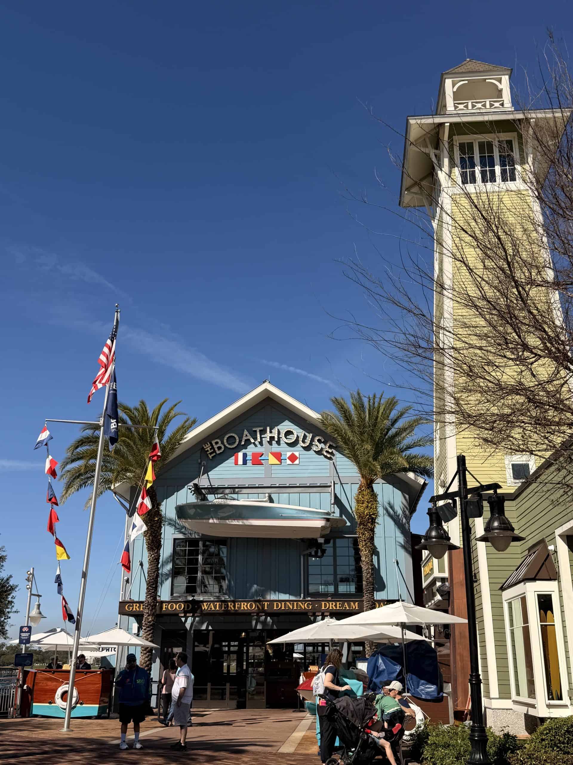 Blue waterfront restaurant with tower
