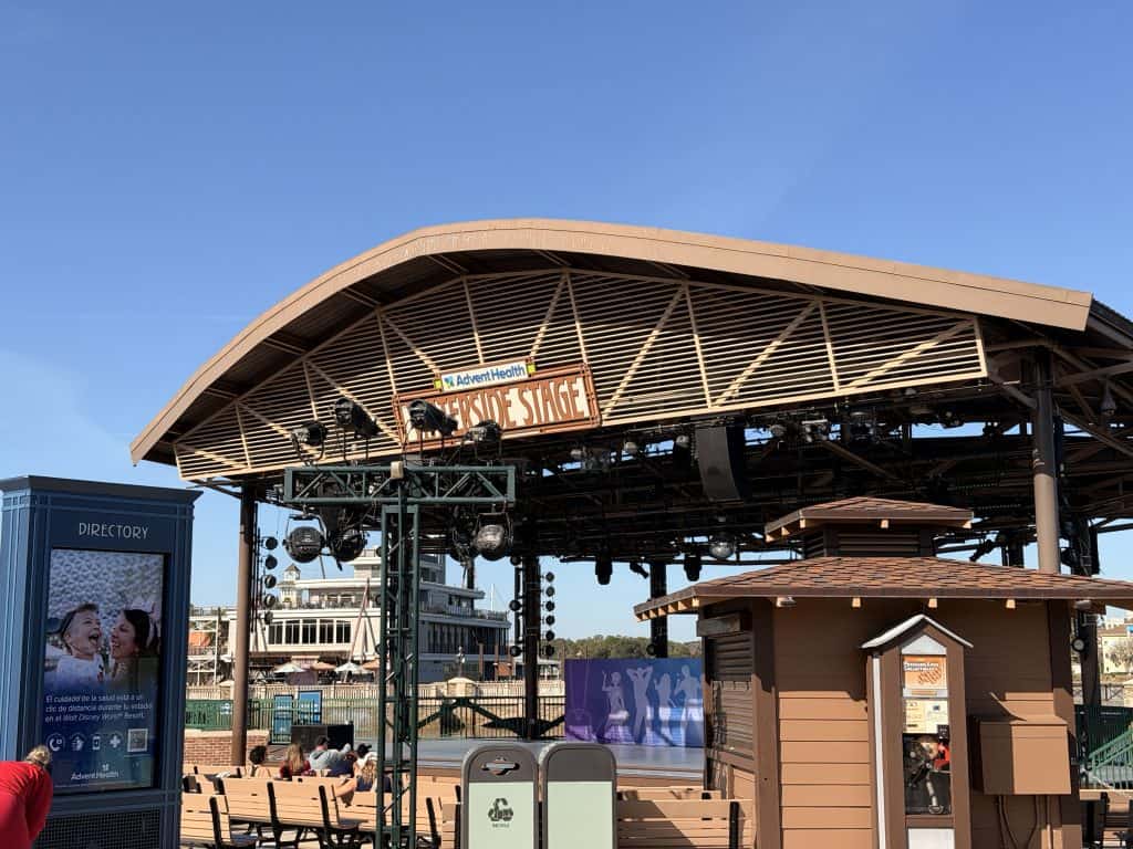 Outdoor riverside stage with seating