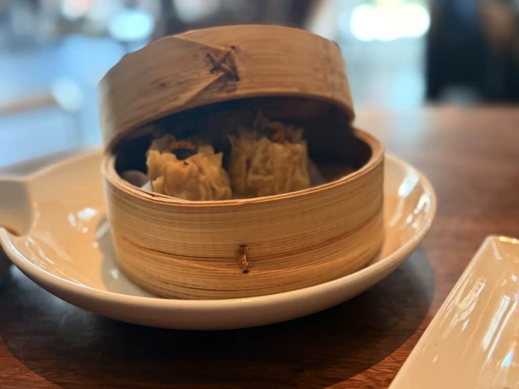 Steamed dumplings in bamboo steamer