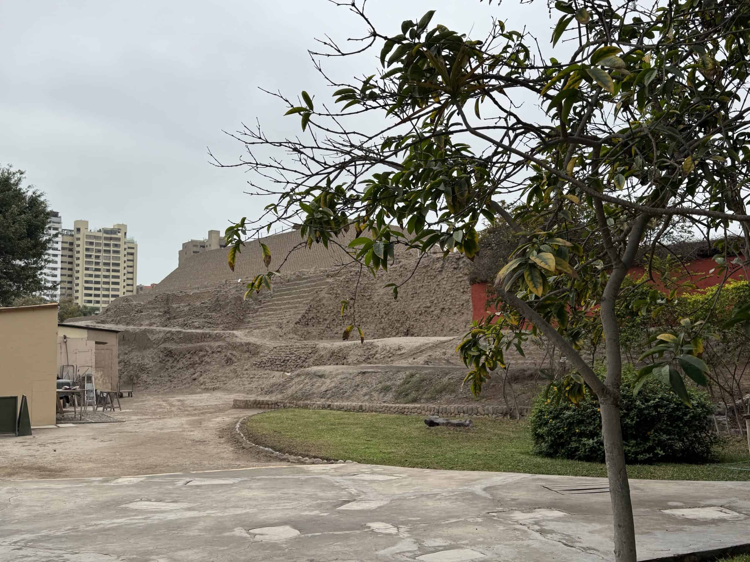 Ancient adobe pyramid in city