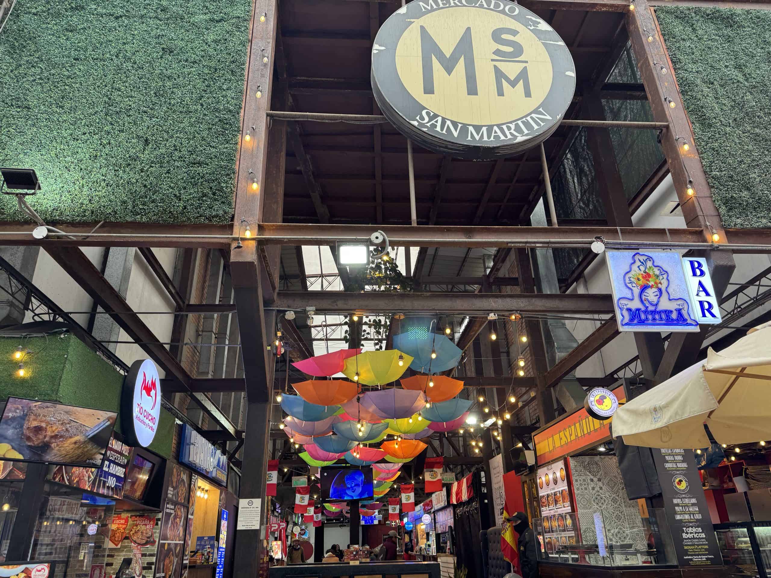 Colourful umbrellas hanging in market