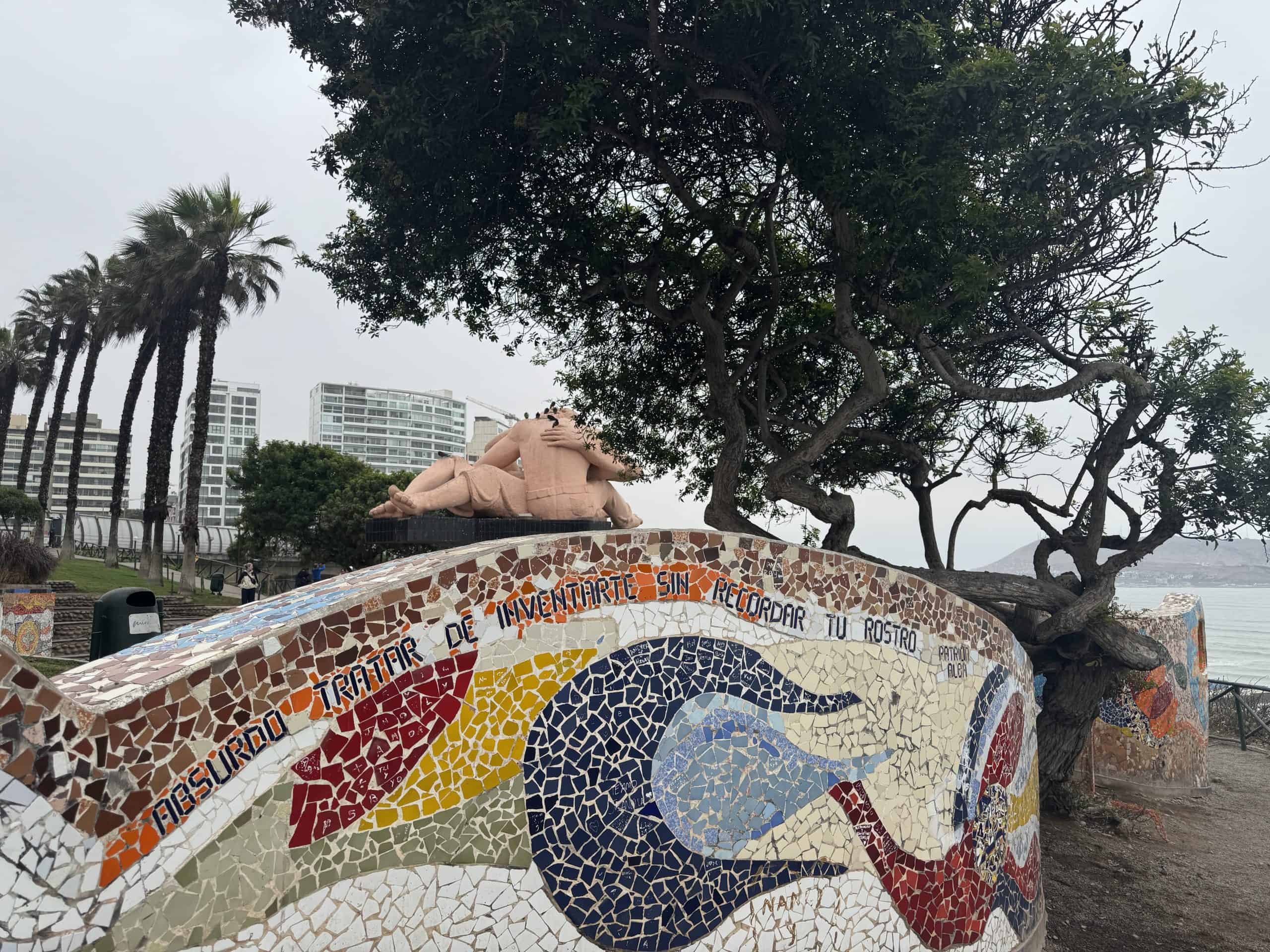 Mosaic bench with reclining figure
