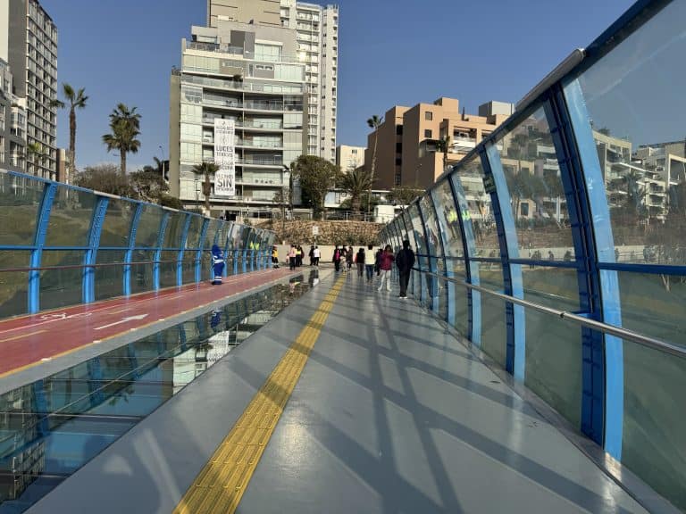 Pedestrian bridge with blue railings