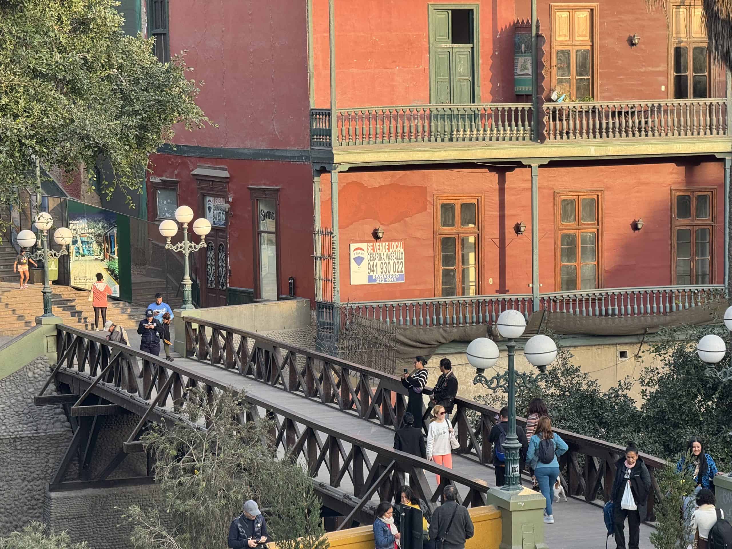 Wooden bridge over cobblestone street