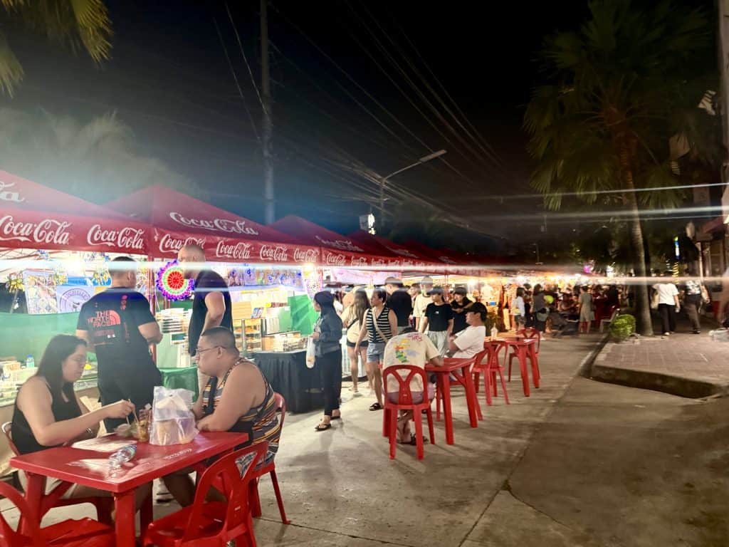 Outdoor night market with food stalls