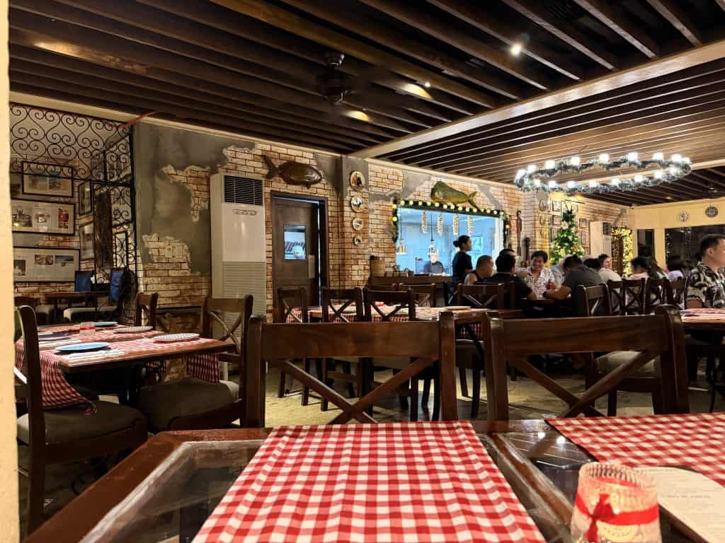 Rustic restaurant with red checkered tables