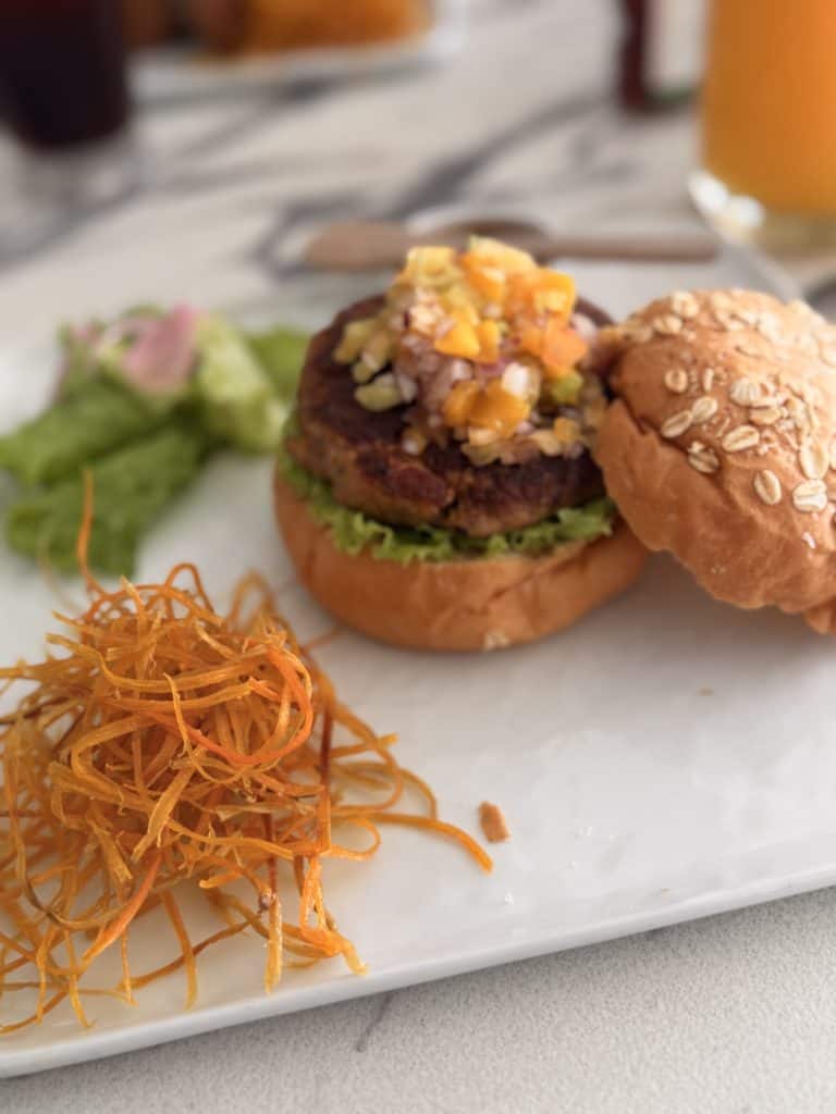 Veggie burger with shredded carrots