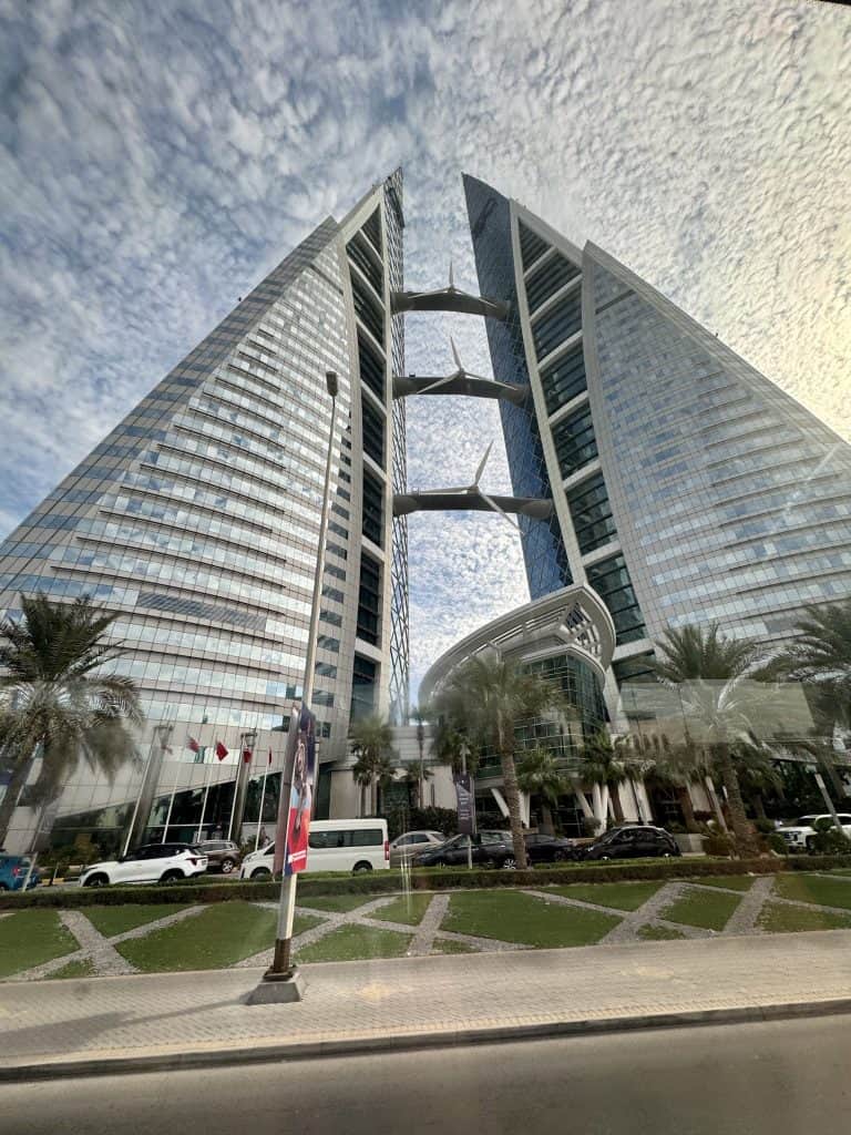 Modern glass skyscraper with arch