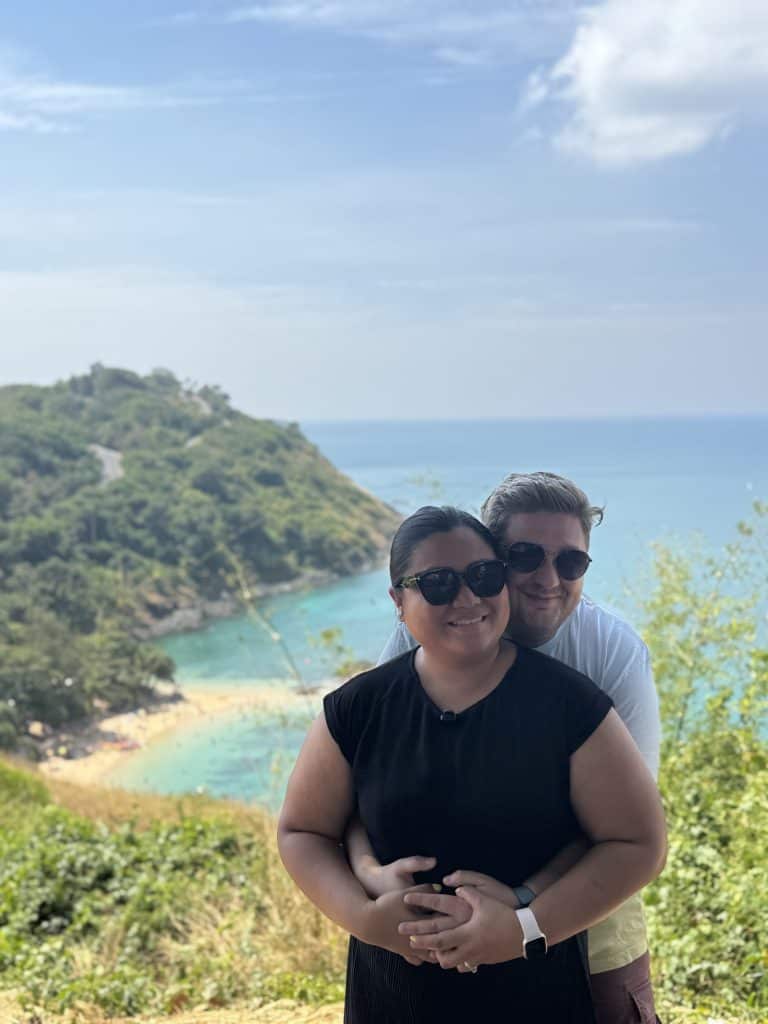 Couple posing with ocean view