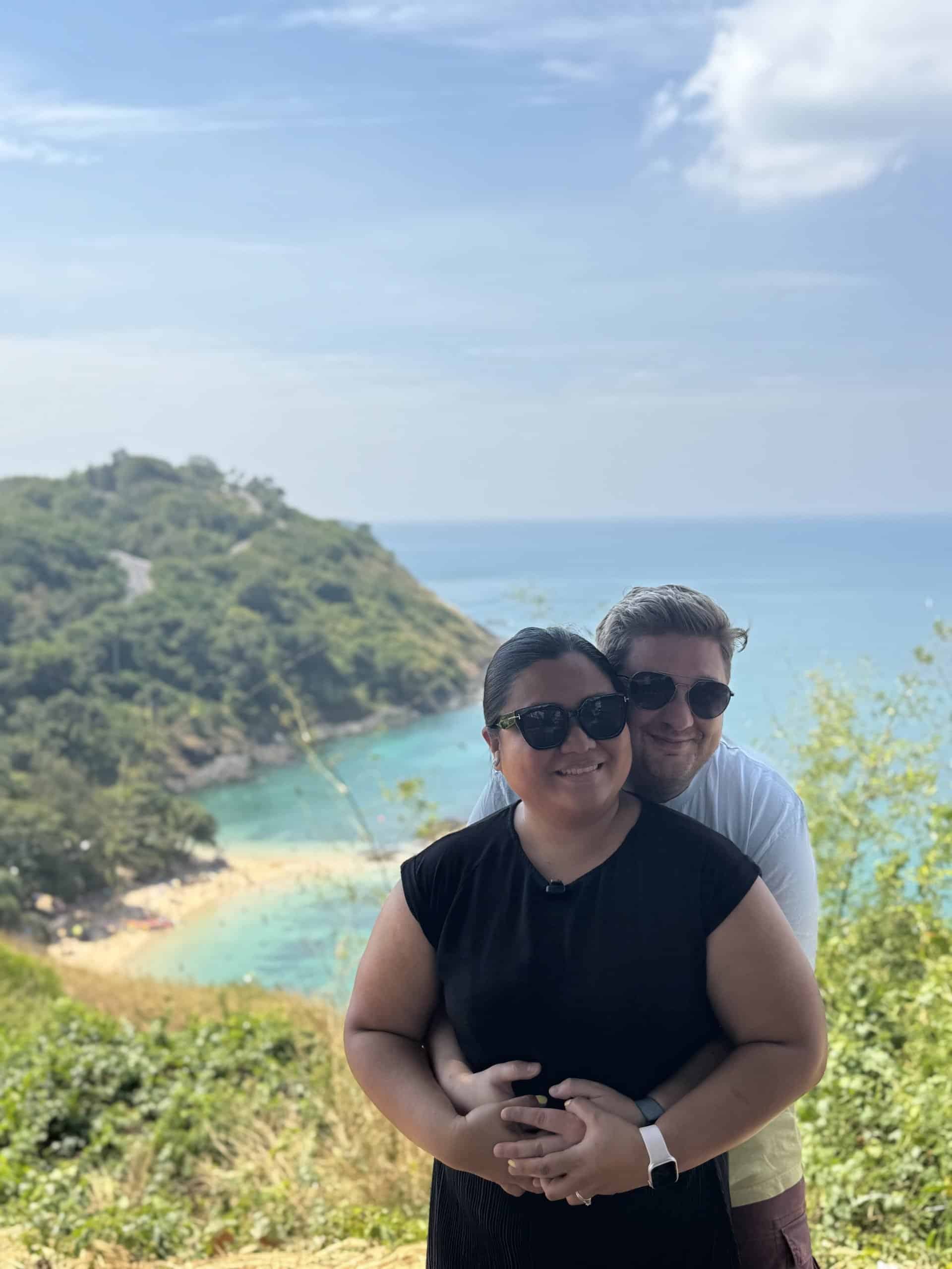 Couple posing with ocean view