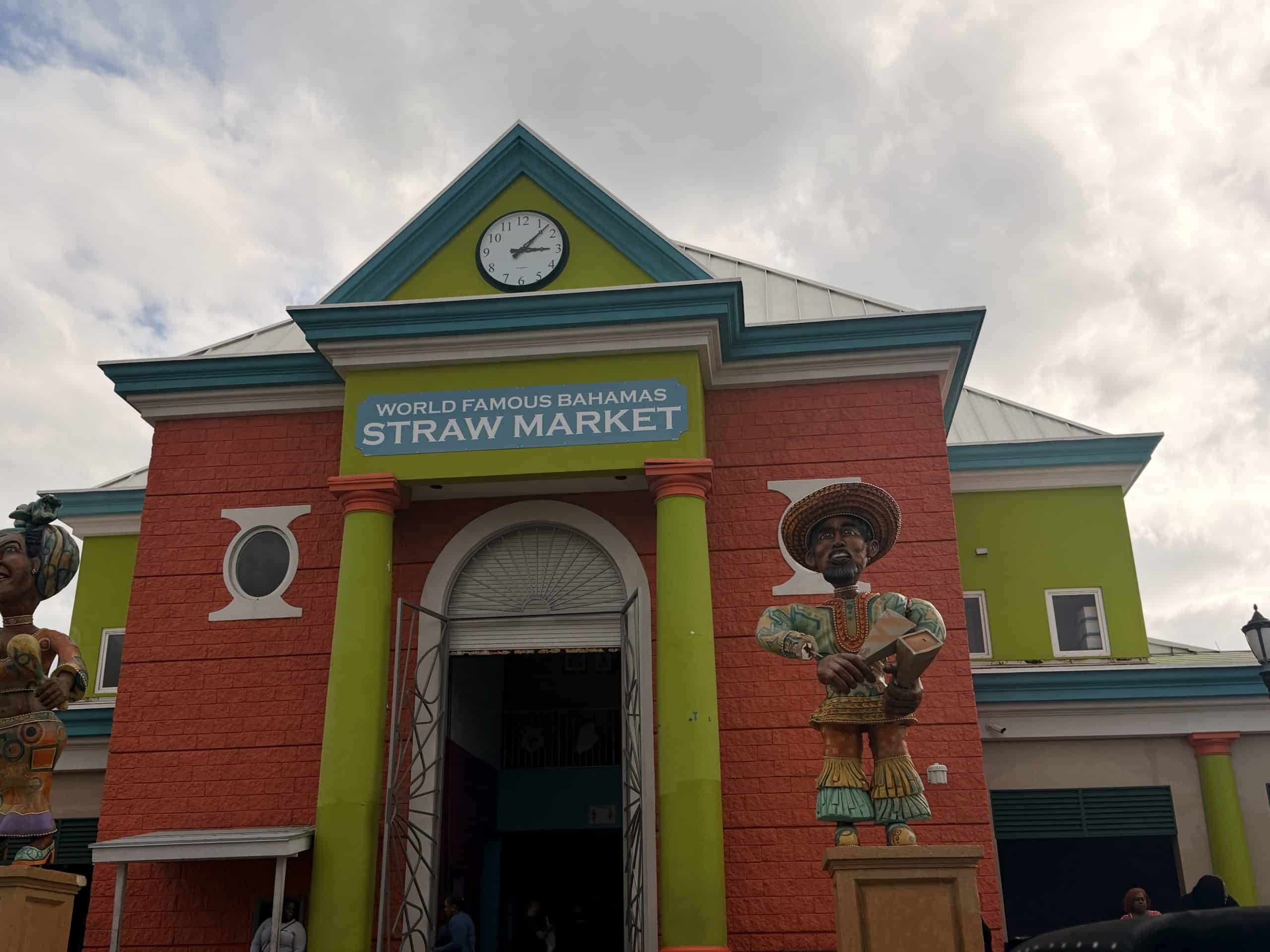 Colourful building with straw market sign
