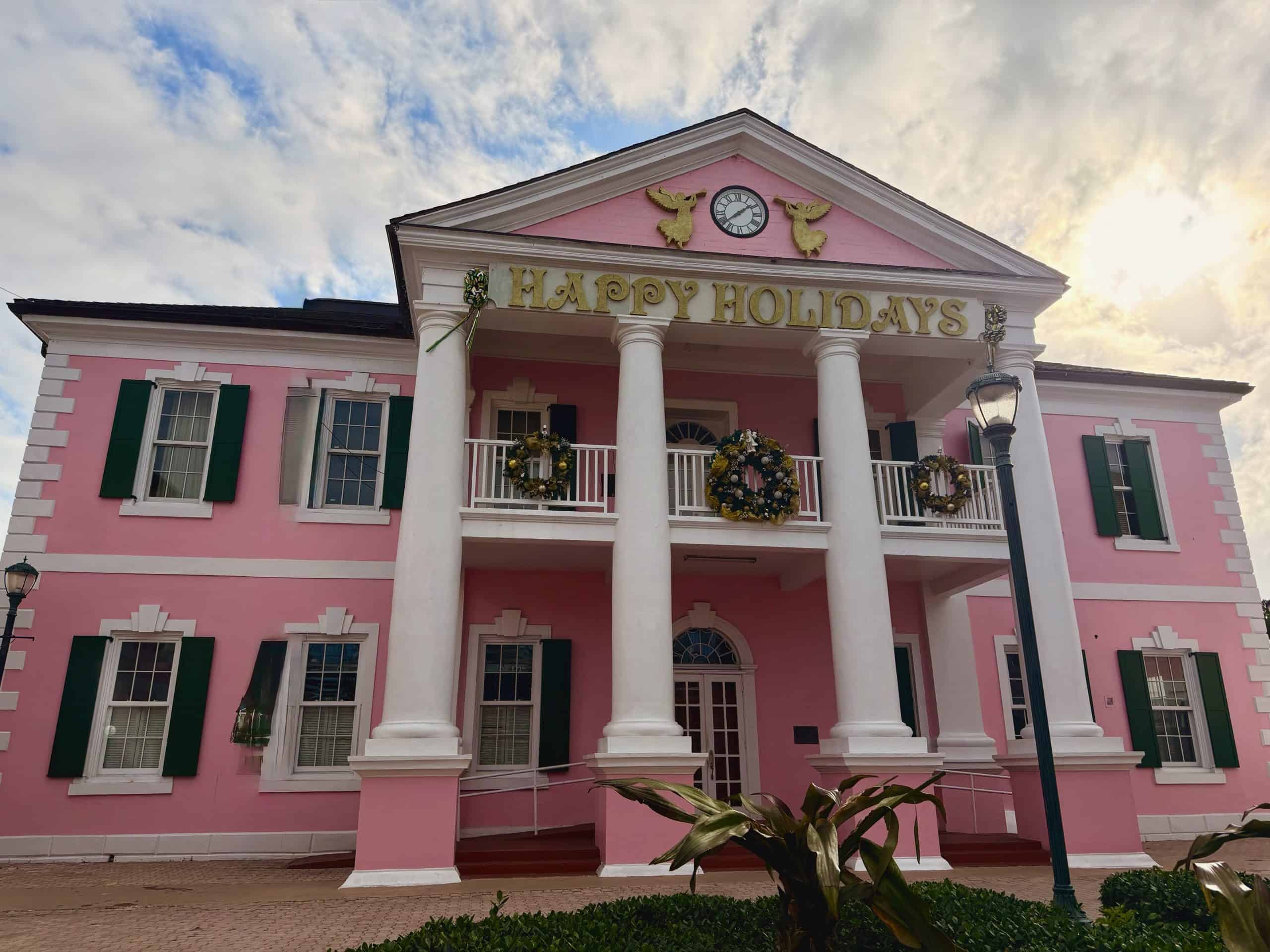 Pink building with holiday decorations