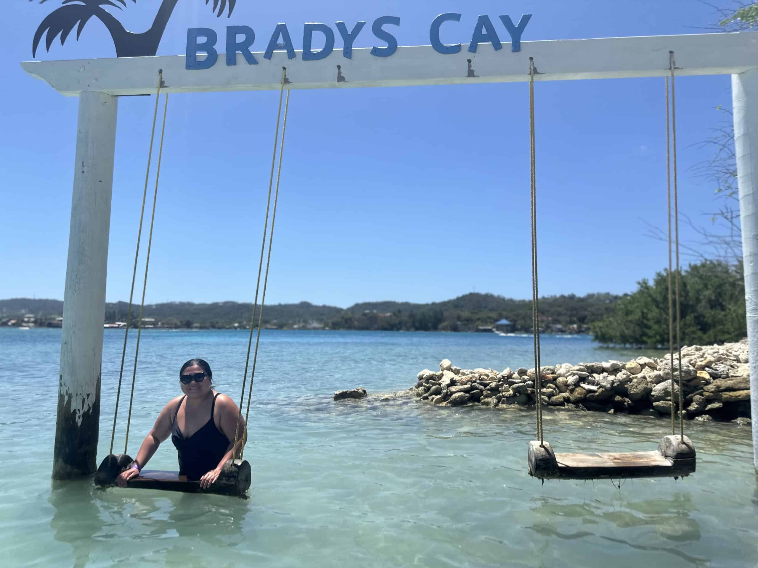 Woman on swing in water