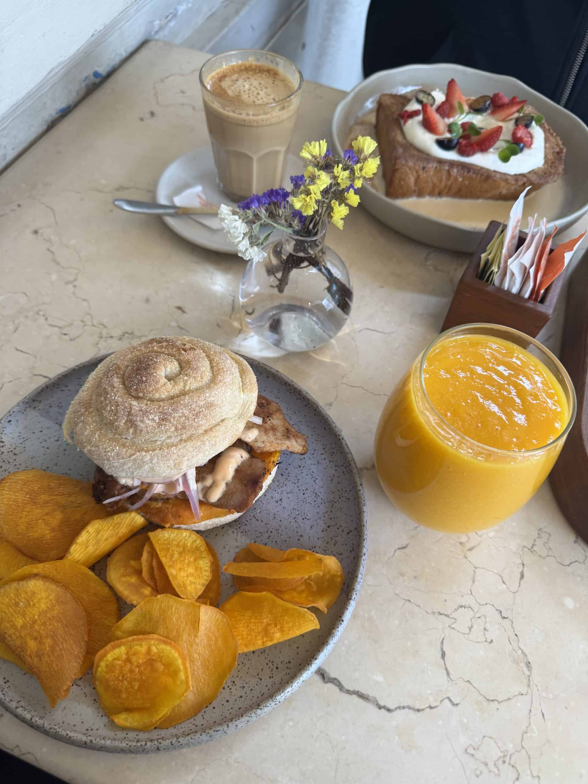 Brunch with sandwich chips juice