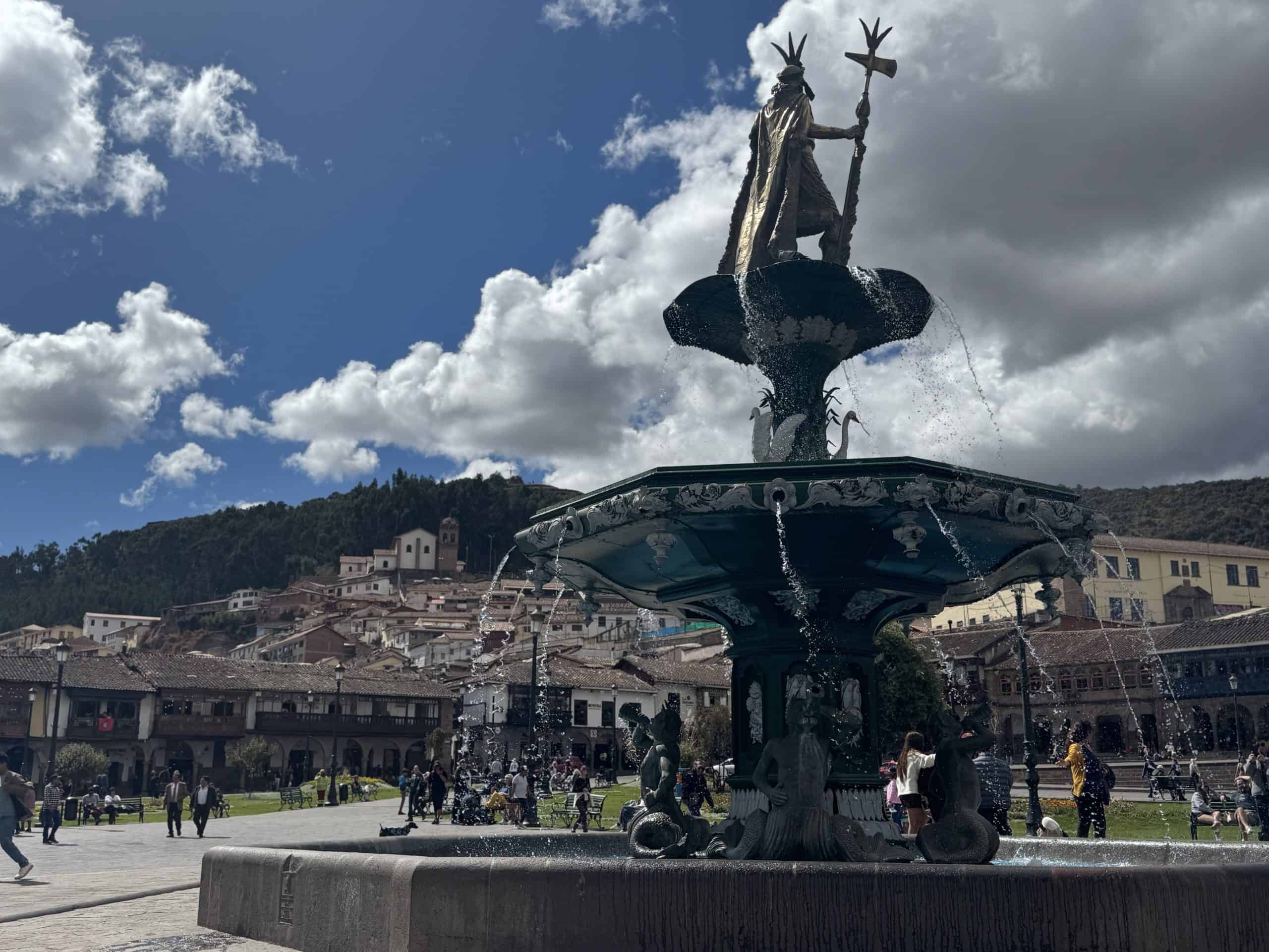 Ornate fountain with statue top