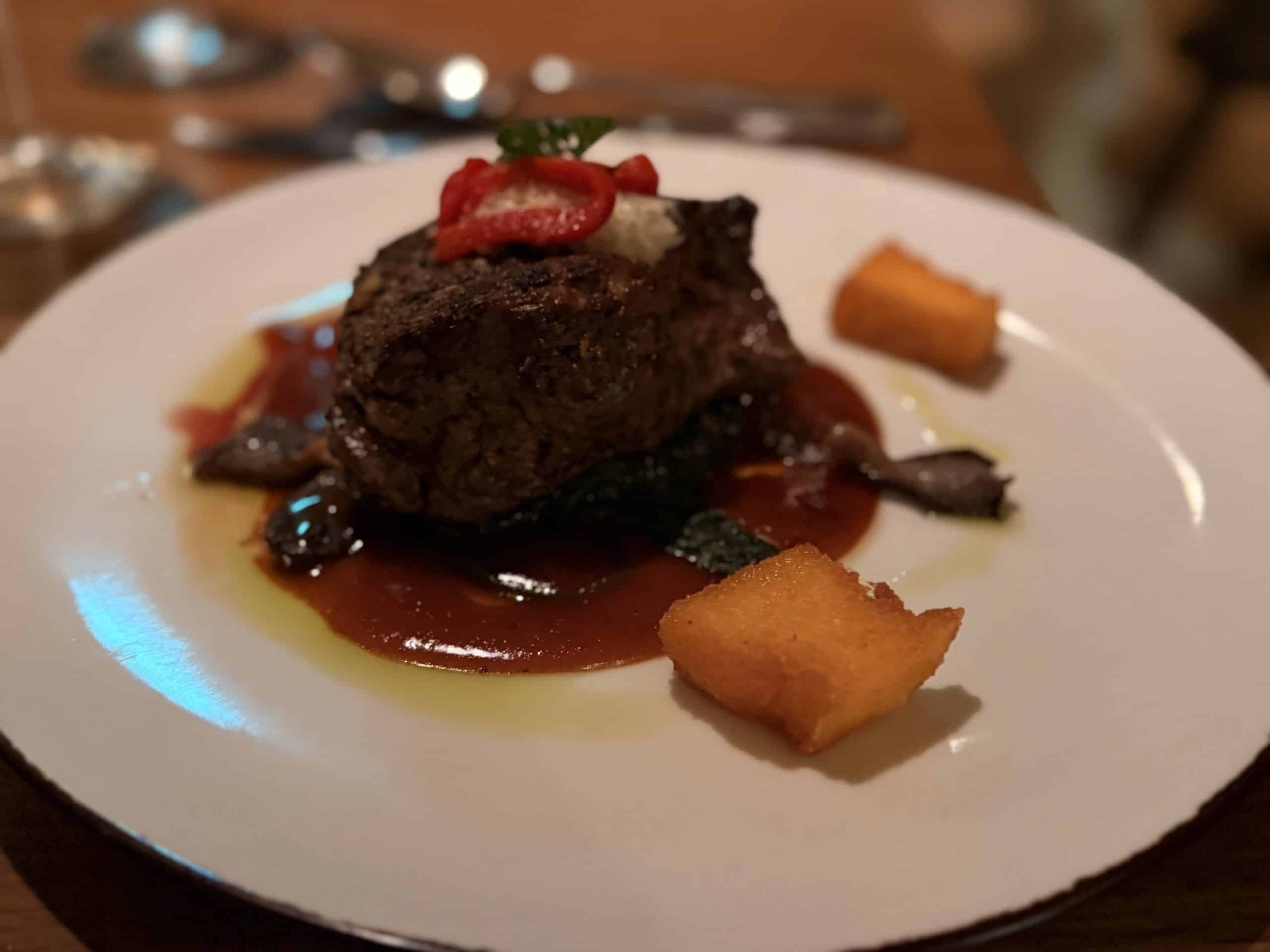 Steak with sauce and garnish