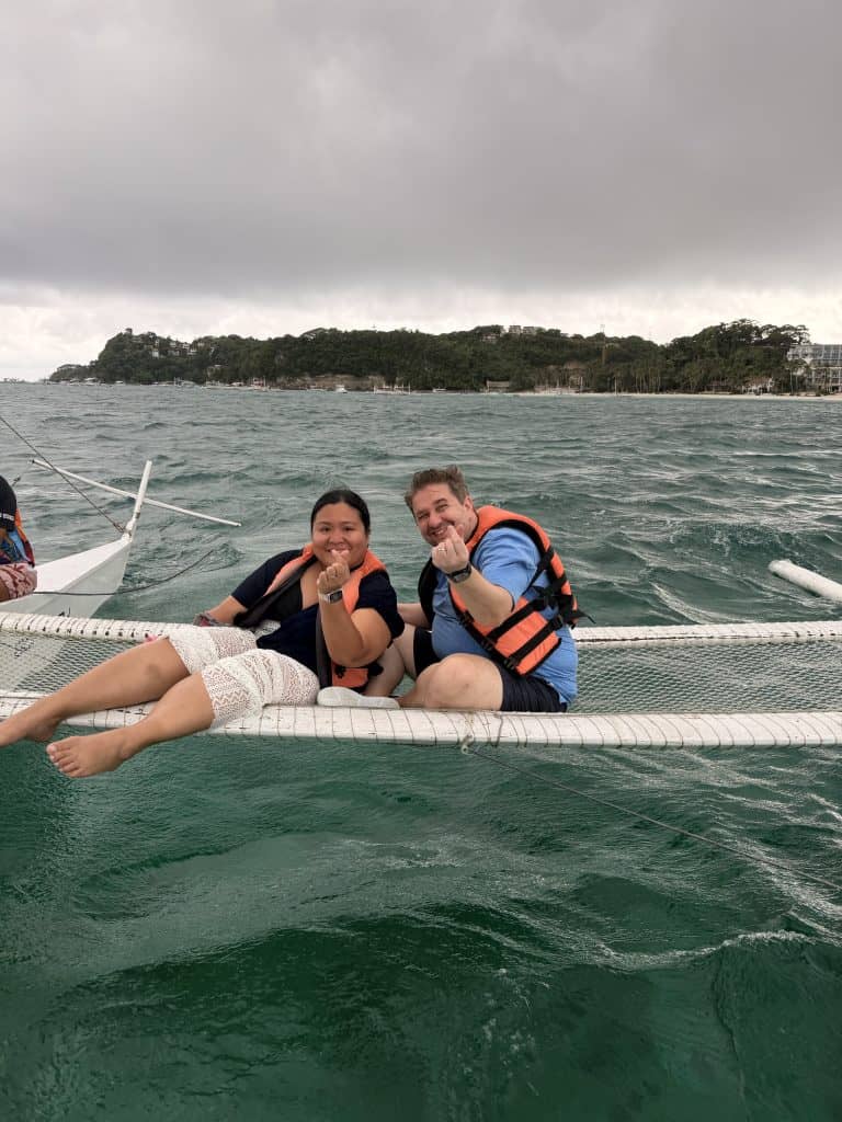 Two people on boat netting